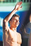 Marchand shatters world record in 200m medley