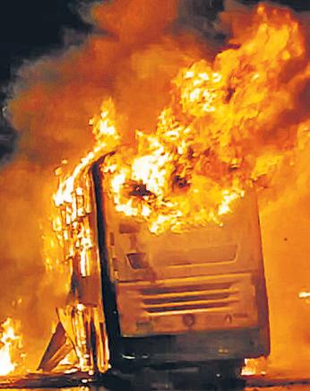 20 killed as bus bursts into flames after bike collision