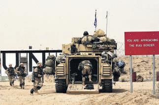 US, allies launch invasion of Iraq after missile blitz