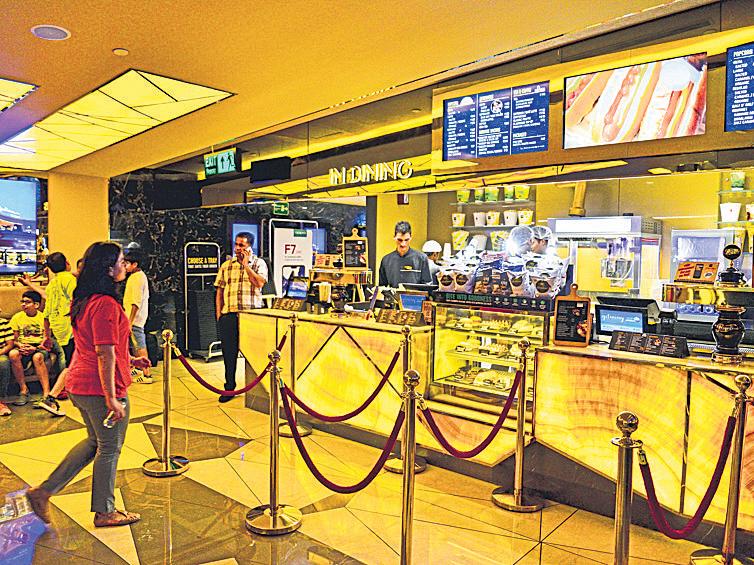 Small-town multiplexes go gourmet. Will the plan work?