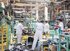 Festive demand, tax cut power India's auto sales in September