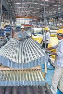 Mfg PMI rebounds, risks persist