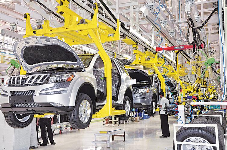 Auto firms agree on emission relief for small trucks