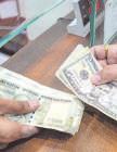 Rupee tumbles against the dollar on trade war fears
