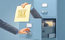 Will NRI share swap trigger taxes in India?