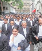 Law firms lavish equity roles on more partners