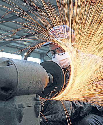 Industrial output rises 1.5% in June, slowest in 10 months