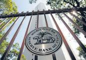 Rupee edges up on central bank's watch