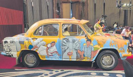 The yellow taxi gets a designer touch for 'pujas'