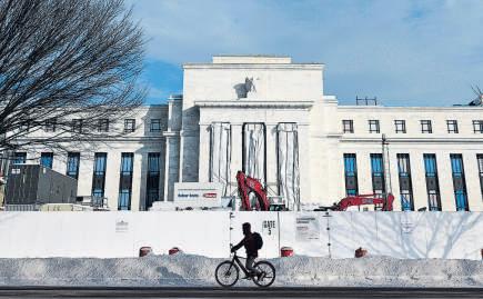 Fed holds rates steady for first time since July