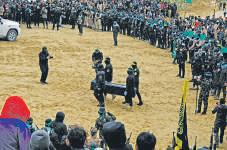 Hamas Turns Handover of Dead Israeli Hostages into a Spectacle