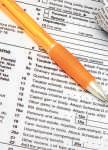 Do joint accounts with parents trigger tax liabilities for NRIs?