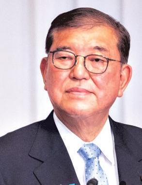 Japan's Ishiba tries to buy time after election loss