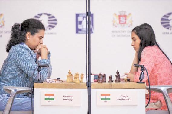 Deshmukh outwits Humpy, becomes FIDE champion
