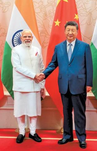 Modi and Xi vow to stabilise world trade