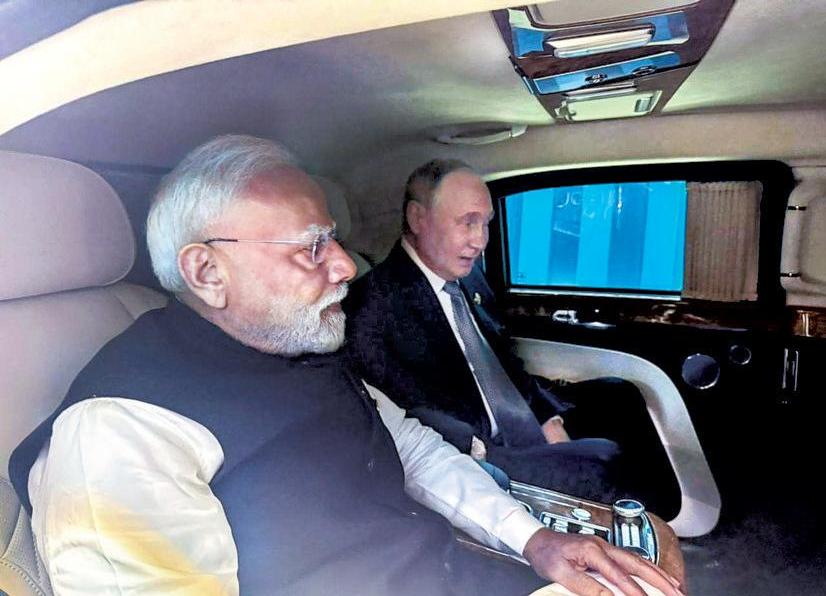 Hugs & handshakes: Modi, Putin send out a message