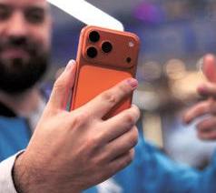 Apple revenue tops $100 bn for first time