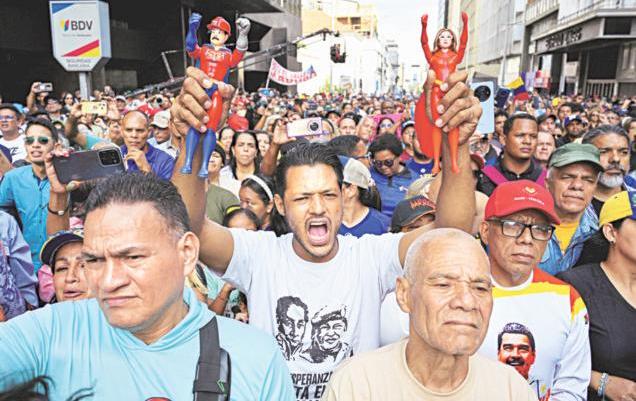 Maduro rival Machado vows to return home, wants election