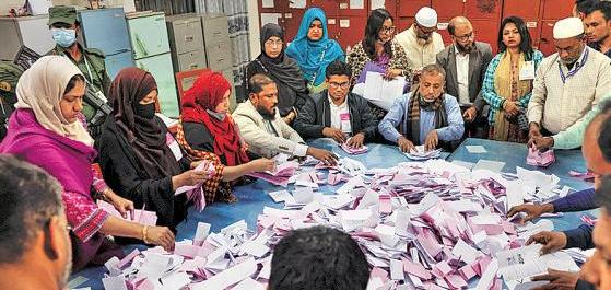 Close race in B'desh polls on strong turnout