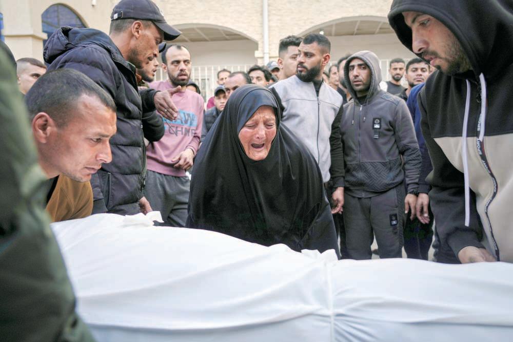 Israel's sudden airstrikes overwhelm Gaza hospitals