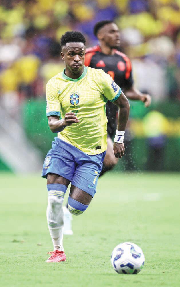 Vinicius strike helps Brazil battle past Colombia, Peru beat Bolivia
