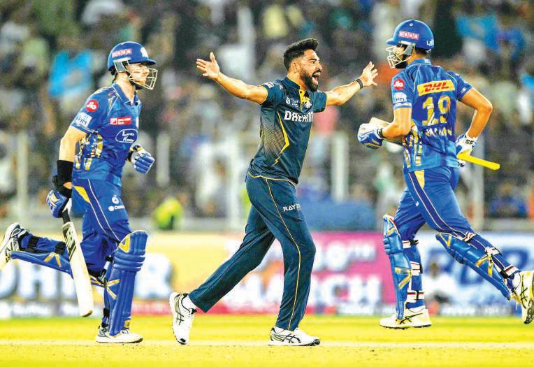 Siraj, Krishna star as Gujarat open account with win over MI