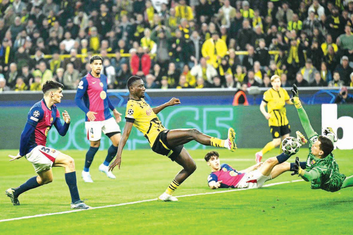 Barcelona suffer morale blow in Dortmund amid quadruple hunt