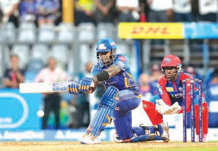 Santner, Bumrah and Suryakumar help MI register 59-run victory over DC to secure IPL playoffs spot