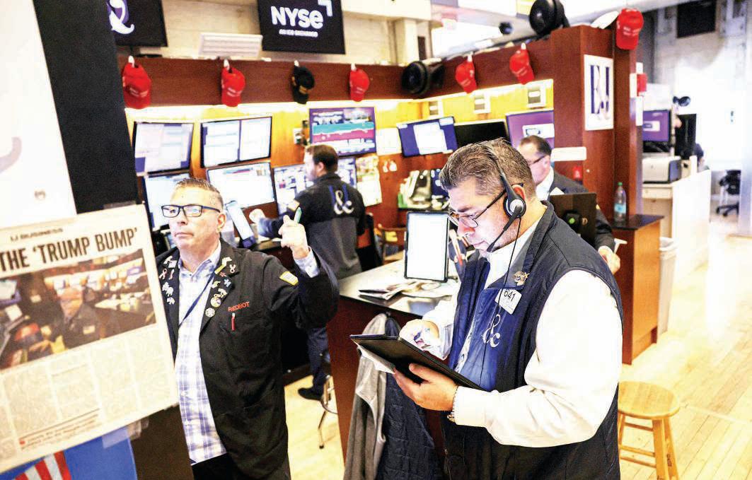 Stocks climb on AI and rate cut hopes, unfazed by tariff moves