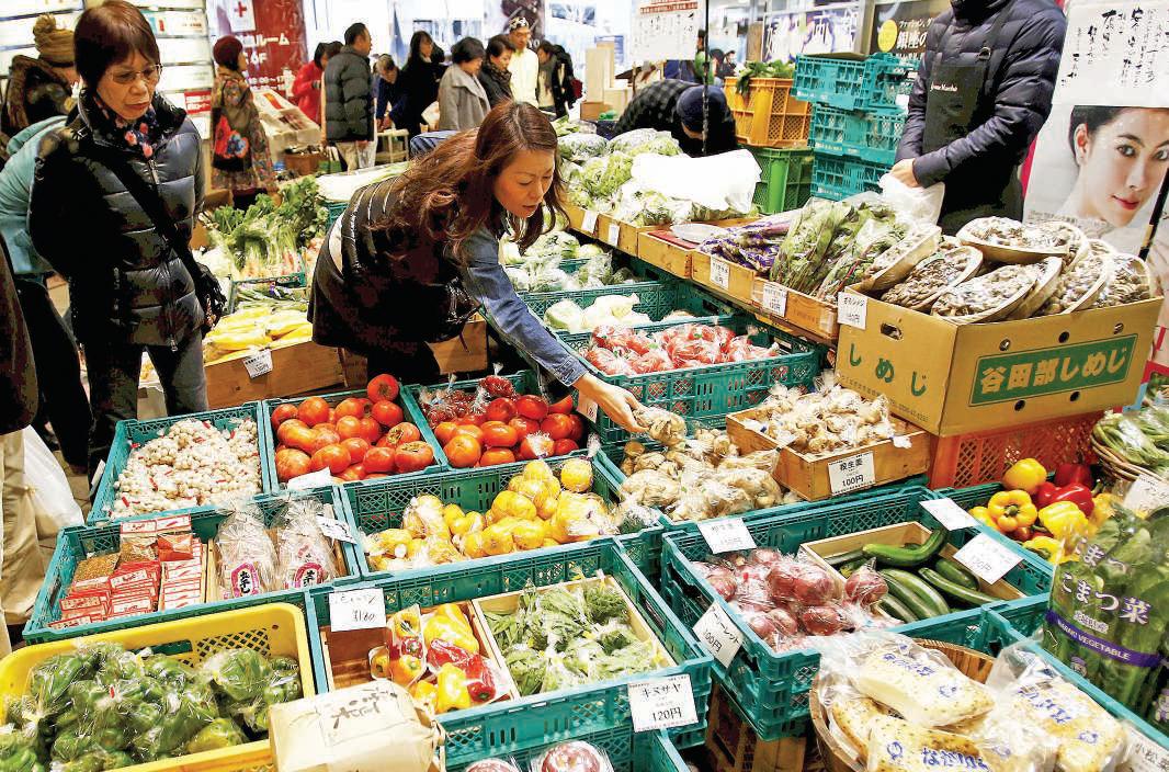 BoJ to consider revising up inflation forecast at July meet