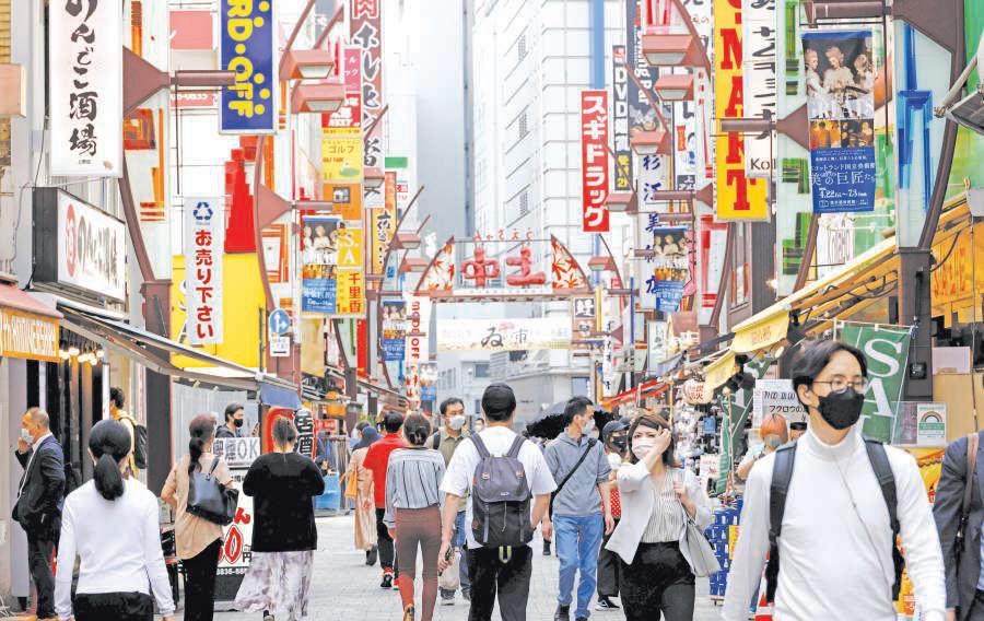 BoJ turns less gloomy on economy, keeps interest rate hike chance alive