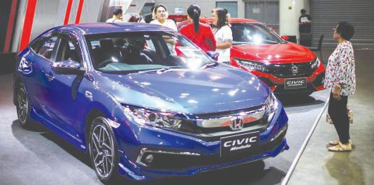 Honda Motor lifts full-year forecast