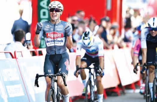 Philipsen rediscovers rhythm to sprint to Vuelta stage one win