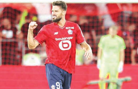 'Big brother' Giroud strikes late to lift Lille past Monaco; Lorient rout Rennes