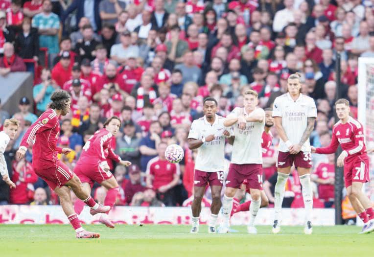 Reds pip Arsenal, City rocked by Brighton as West Ham win