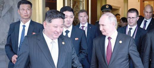 Putin meets Kim, praises N. Korea troops in Russia
