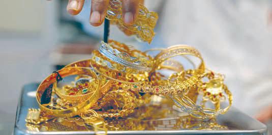 Gold surges to set fresh record high