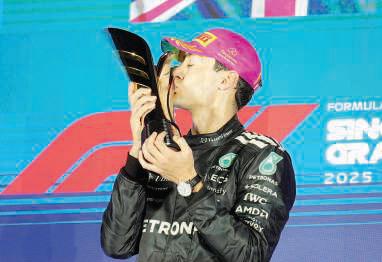 Russell dominates Singapore Grand Prix as McLaren secure constructors' title