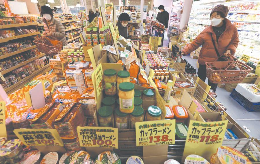 Japan wholesale inflation holds steady, yen fall adds to BoJ pressure