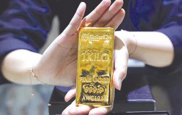 Trump's cooler China talk calms sentiment, gold hits record highs