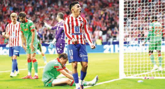 Almada strikes as Atletico edge past Osasuna, Betis hold Villarreal