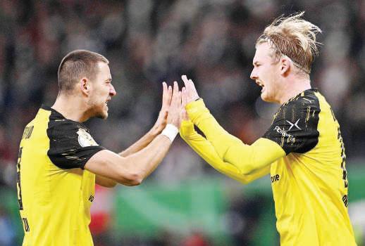Dortmund advance in German Cup after shootout victory over Frankfurt