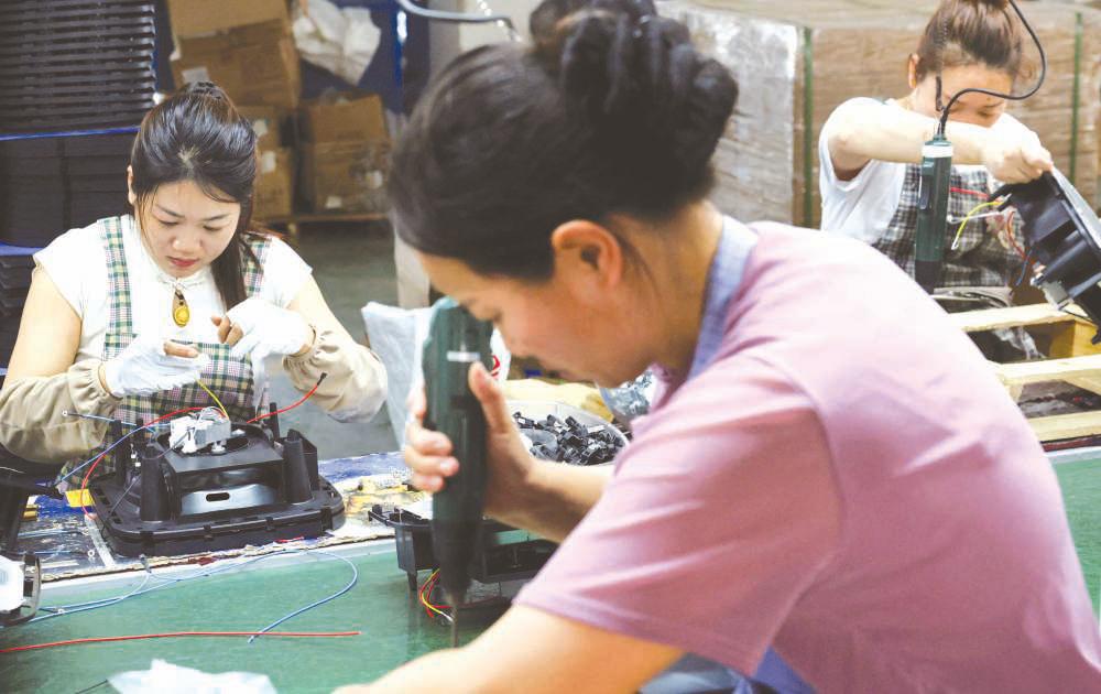 China's factory activity shrinks in October as export orders dry up