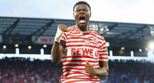 Cologne prevail as nine-man Hamburg go into meltdown