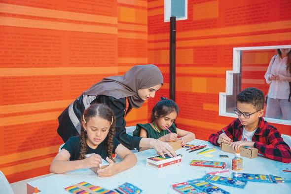 Children craft pet robots at SIBF session