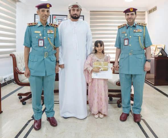 Ajman Police honour girl for honesty