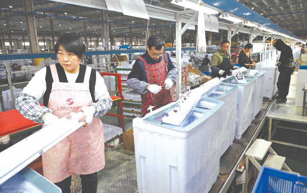 China's factory activity shrinks again in November, services cool