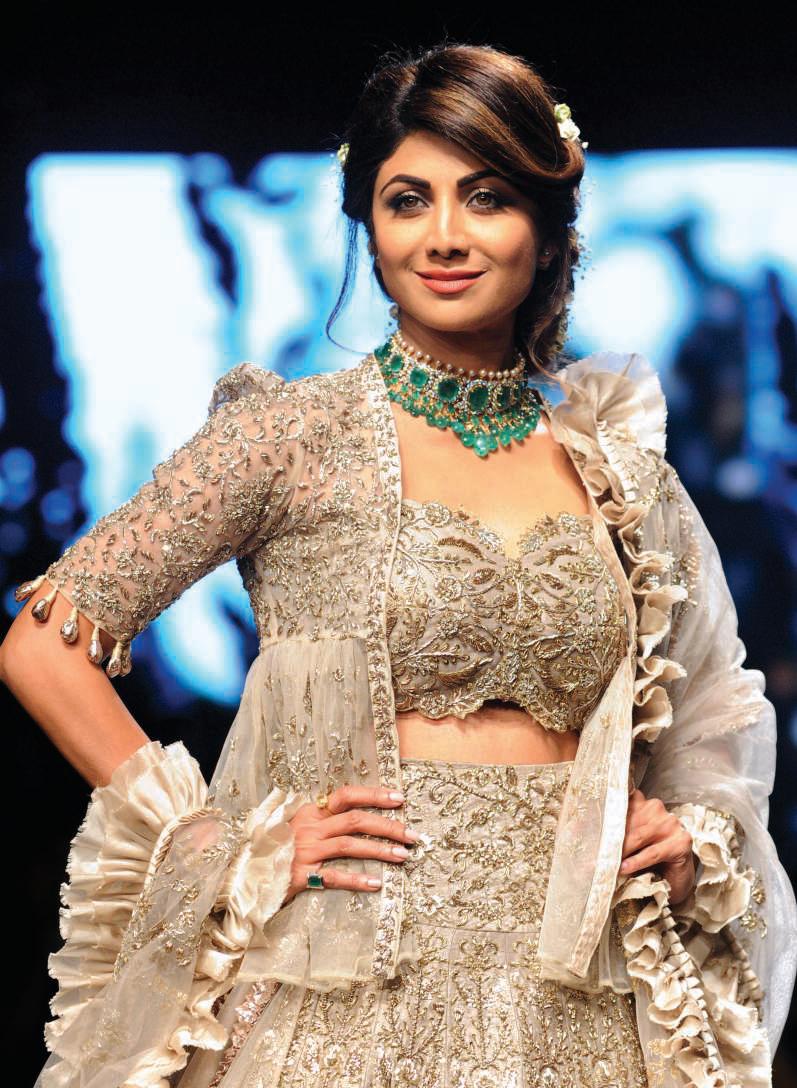 Shilpa strengthens her fitness routine with banded feet-elevated glut bridge