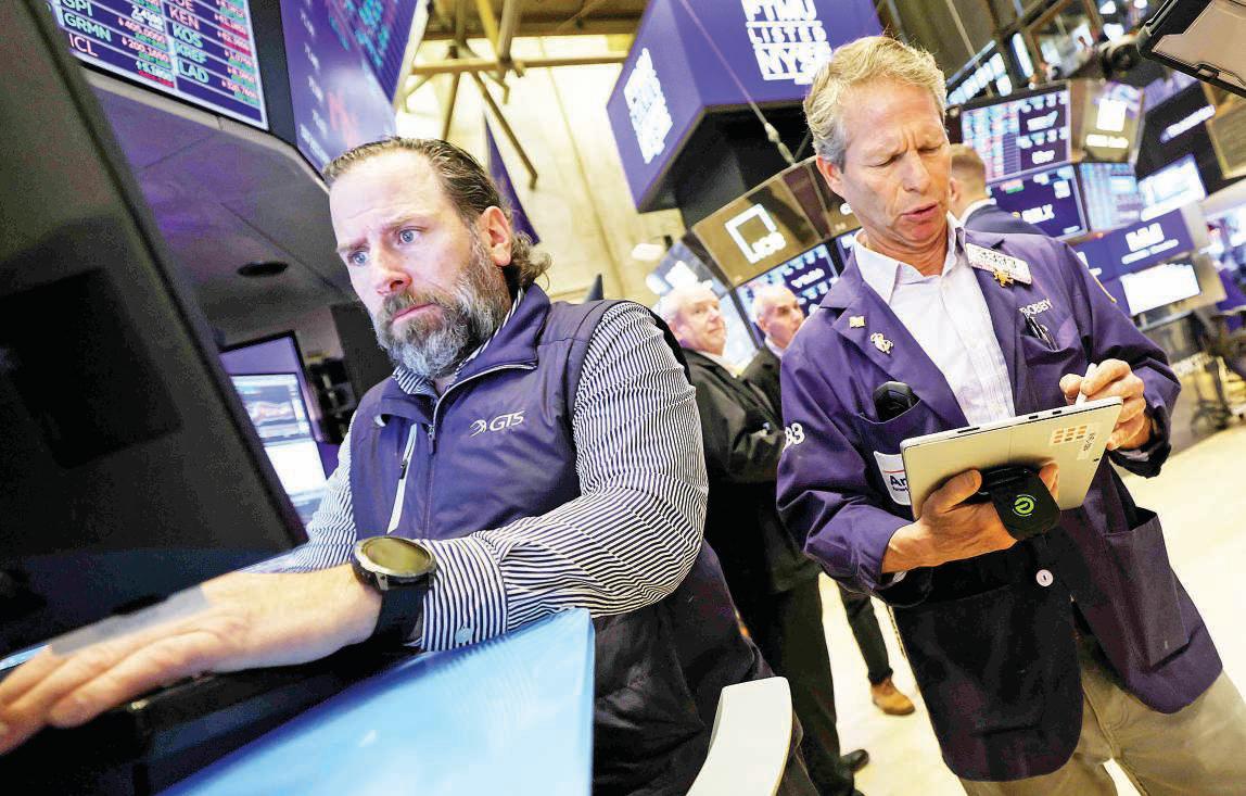 Wall Street drifts near its all-time high as most stock markets surge