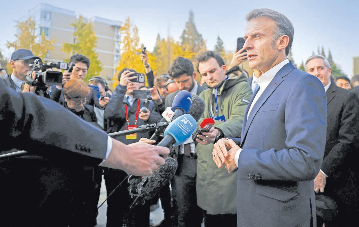 Macron threatens China with tariffs if Beijing fails to reduce trade surplus